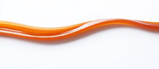 Caramel swirl on white background.