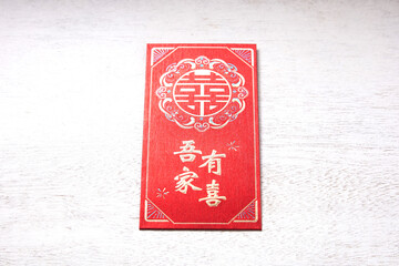 Oriental Red envelope for wedding gifts with gold foil accents, with oriental object surround it,...
