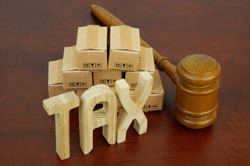 Letters tax, many carton boxes and judge gavel.