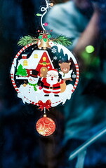 Christmas colored stickers on glass close-up
