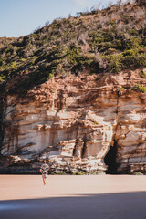A cave in cliff on the beach