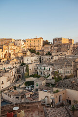 Obraz premium A panoramic view of the historical world heritage city of Matera, Puglia, Italy, la città dei sassi, with its cave houses