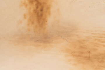 Old crumpled beige paper background.