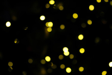 Black background with colorful bright dots. Bright colored dots on black background.