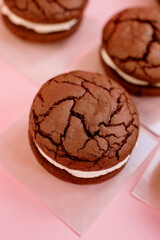 Freshly baked Chunky  Cookie with Cream Cheese isolated on a pink background