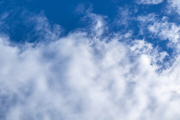 Photograph of white clouds on a white background. Concept: Nature, wind, clouds.