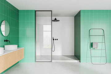 Modern bathroom interior with green tiled walls and minimalist design. 3D Rendering