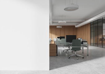 Modern office interior with empty desks and chairs, featuring a blank white wall on the left, glass partitions, and wooden paneling. 3D Rendering