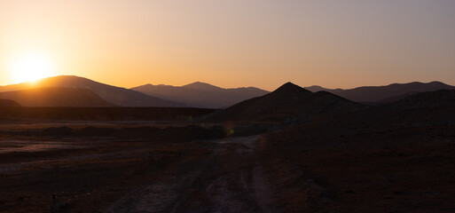 Beautiful yellow sunset in the mountains. Azerbaijan.