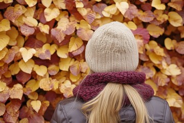 Woman with Blonde Hair and Knitted Hat in Autumn