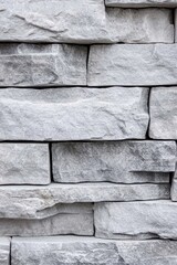 Close up of a grey stone wall texture for a background or backdrop use
