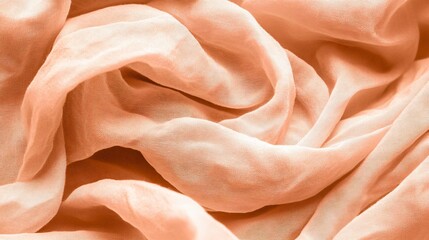 Fototapeta premium Peach Silk Fabric Drape Texture Background Soft Elegant Smooth Waves