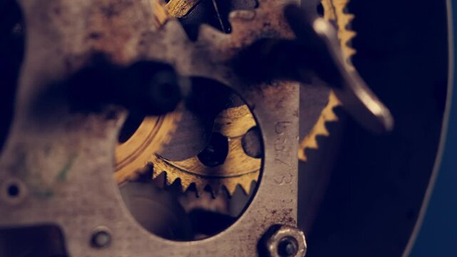 Close-up view of intricate clock mechanism showcasing gold gears in motion with rich details and texture up close