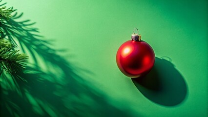 Minimalist Christmas Tree & Red Bauble Sunny Shadow Green Background Holiday Party New Year