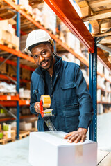 worker taping boxes closed before delivery in a shipping warehouse