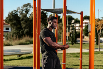 Fitness Motivation: Athlete Stretching Outdoors