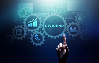 Dividends button on virtual screen. Return on Investment ROI financial business wealth concept.