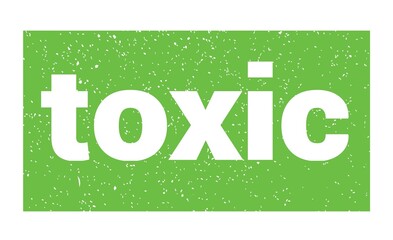 toxic text written on green stamp sign.