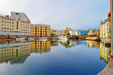 Obraz premium Alesund city on a summer day, Norway. View of colorful Art Nouveau architecture port