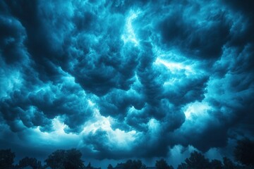 Fototapeta premium Dramatic storm clouds fill the sky over a rural landscape during late evening hours