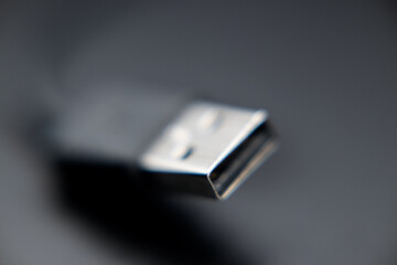 USB cable connecting electrical devices
