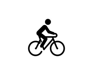 silhouette of a person riding a bike