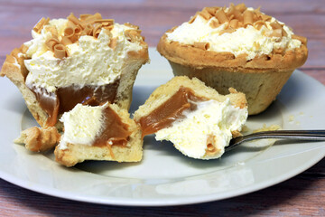 caramel and fresh cream sweet pastry tart.