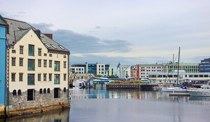 Fototapeta premium Alesund city on a summer day, Norway. View of colorful Art Nouveau architecture port
