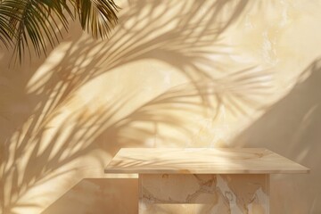 Fototapeta premium Tropical palm tree shadow on cream wall with marble table.