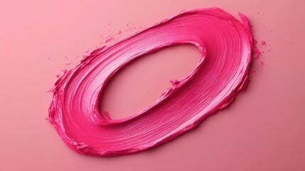 Swirl of vibrant pink paint on smooth pink background