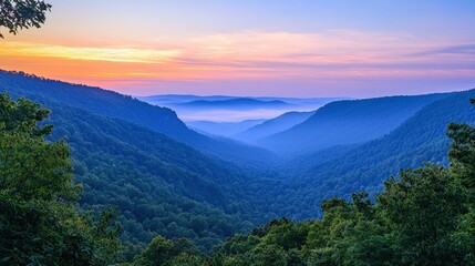 A stunning sunrise over a misty valley, showcasing layered mountains and lush greenery, creating a serene and picturesque landscape.