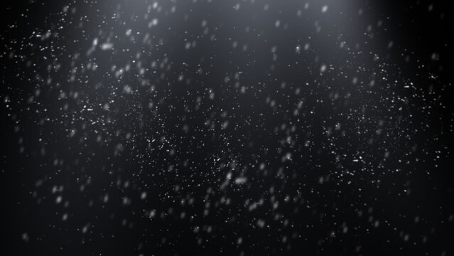 Falling snowflakes with light source in night sky. Magic winter background. Useful as photoshop screen layer or as an overlay for adding to photos.