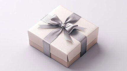 Elegant gift box with silver ribbon on light background