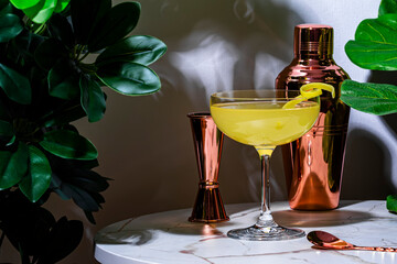 Monte Cassino, alcoholic cocktail drink with rye whiskey, liqueur and lemon juice. Marble table in...