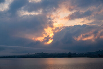 Beautiful view of Diatas Lake in the morning with sunrise sky.