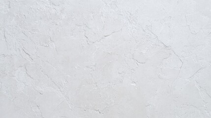 Smooth light gray concrete texture showcasing subtle imperfections from a top-down perspective in a naturally illuminated environment