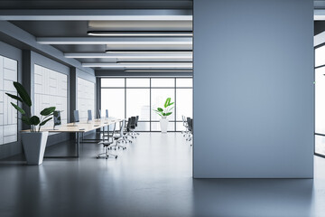 Fototapeta premium Modern empty office interior with desks, chairs, and plants, bright lighting, and large windows in a professional workspace. 3D Rendering