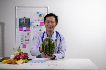 Fototapeta premium Young Asian Nutritionist, Health Doctor, Fruit, Weight Loss