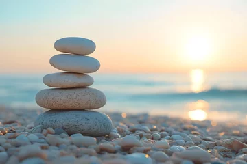 a stack of rocks sitting on top of a beach