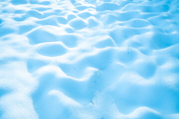 pure white untouched snow shapes.Snowy winter background with falling snowflakes with copyspace background for your concept. High quality photo