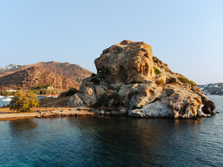 Majestic Rock Formation on Patmos Island by the Beach and Sea