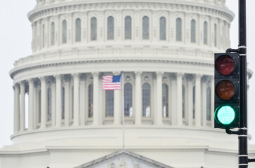 Green light and Capitol in the snow - Red light symbolized a affirmative resolution from the Capitol