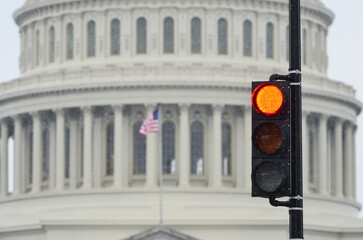 Red light and Capitol in the snow - Red light symbolized a negative resolution from the Capitol