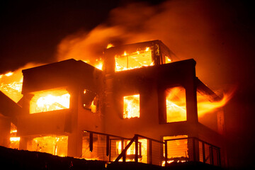 Flames Consume Structure in Palisades Fire Windstorm