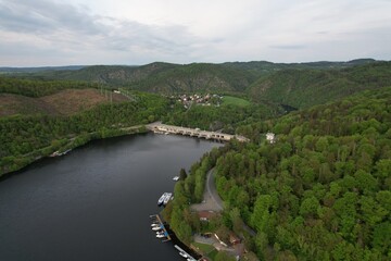 Obraz premium Slapy Reservoir is dam on the Vltava river in the Czech Republic, near to village Slapy. It has a hydroeletrics power station included.Aerial panorama landscape photo 
