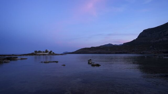 Saint Fokas orthodox chapel in the coast of Greece at sunset