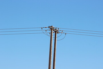 An electric pole with wires
