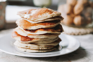 Hot homemade stack of pancakes on plate. Breakfast, brunch time. High quality photo