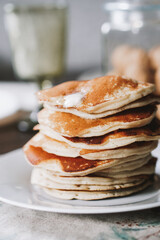 Hot homemade stack of pancakes on plate. Breakfast, brunch time. High quality photo