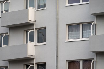 Modern apartment building facade showing balconies and windows